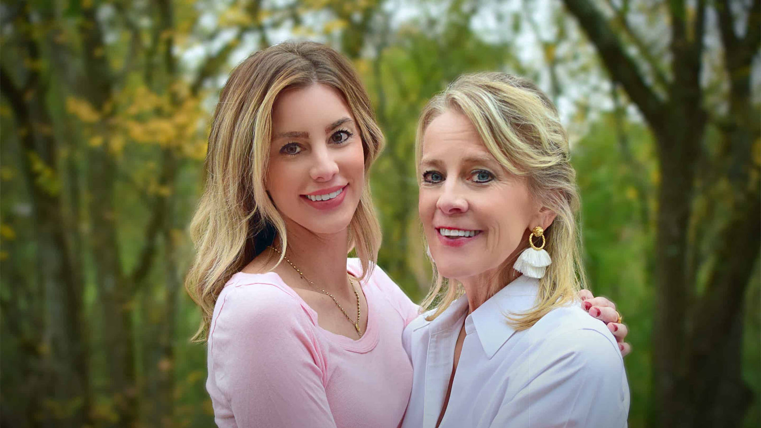 Mother and daughter embracing each other.