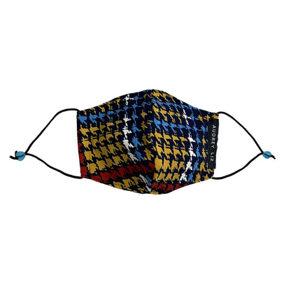 Two-layer face mask in a red, blue, and deep yellow houndstooth print.