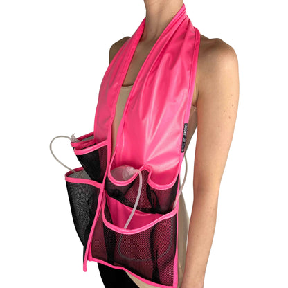 Side view of woman wearing a waterproof scarf over chest, designed for showering after surgery.